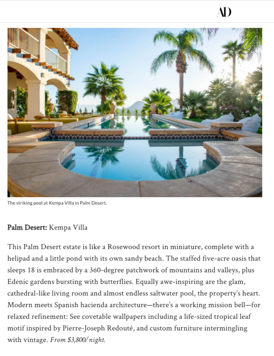 a picture of a swimming pool with palm trees in the background