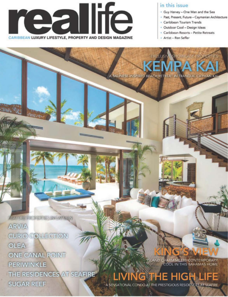 a living room with a lot of windows and a staircase on the cover of a reallife magazine